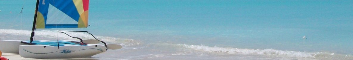 Strand mit Segler auf Antigua (piqs.de ID: 133e8054afda039797f1a29f61550205)
